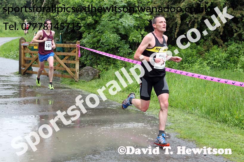 Alisdair Tatham (New York Moor) finishing the George Ogle Memorial 10k. Photo: David T. Hewitson/Sports for All Pics